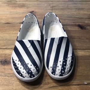 Native Navy and white slip on shoe